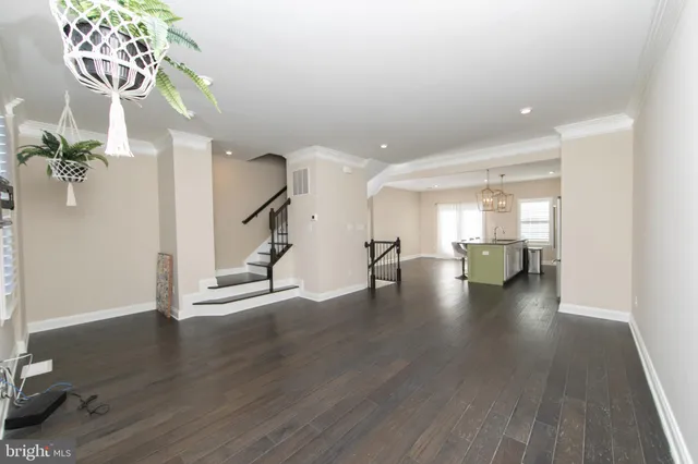 a view of entryway with wooden floor