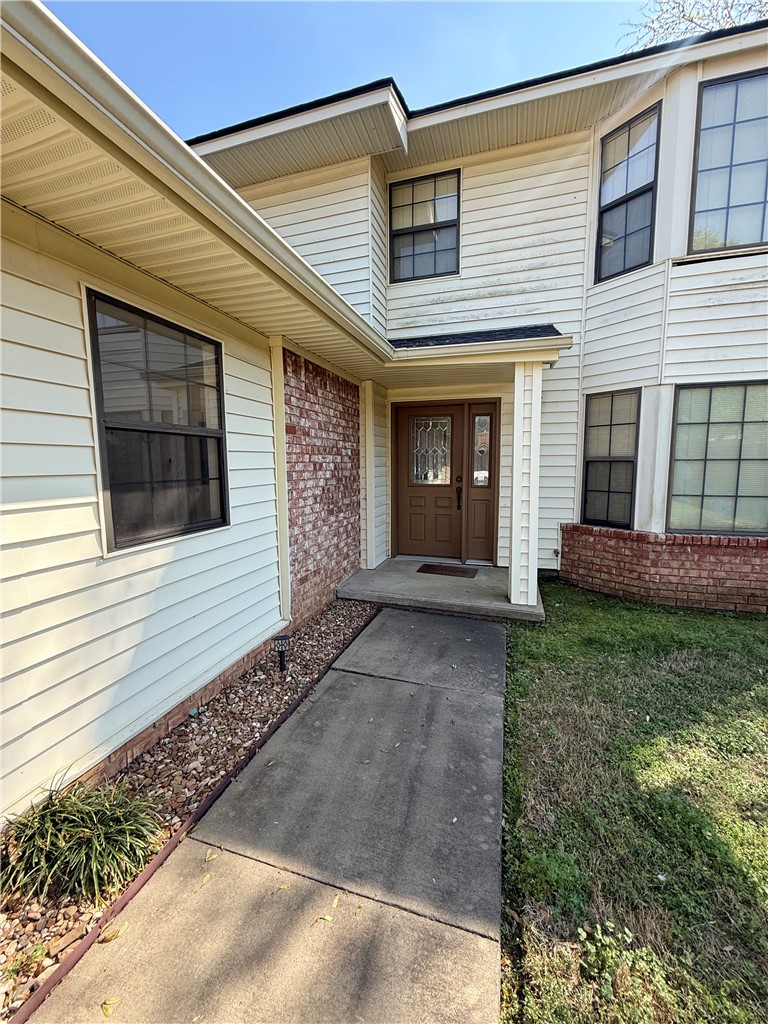 76 Club Road Dover, AR 72837 - Photo 2 of 36 View of exterior entry featuring brick siding