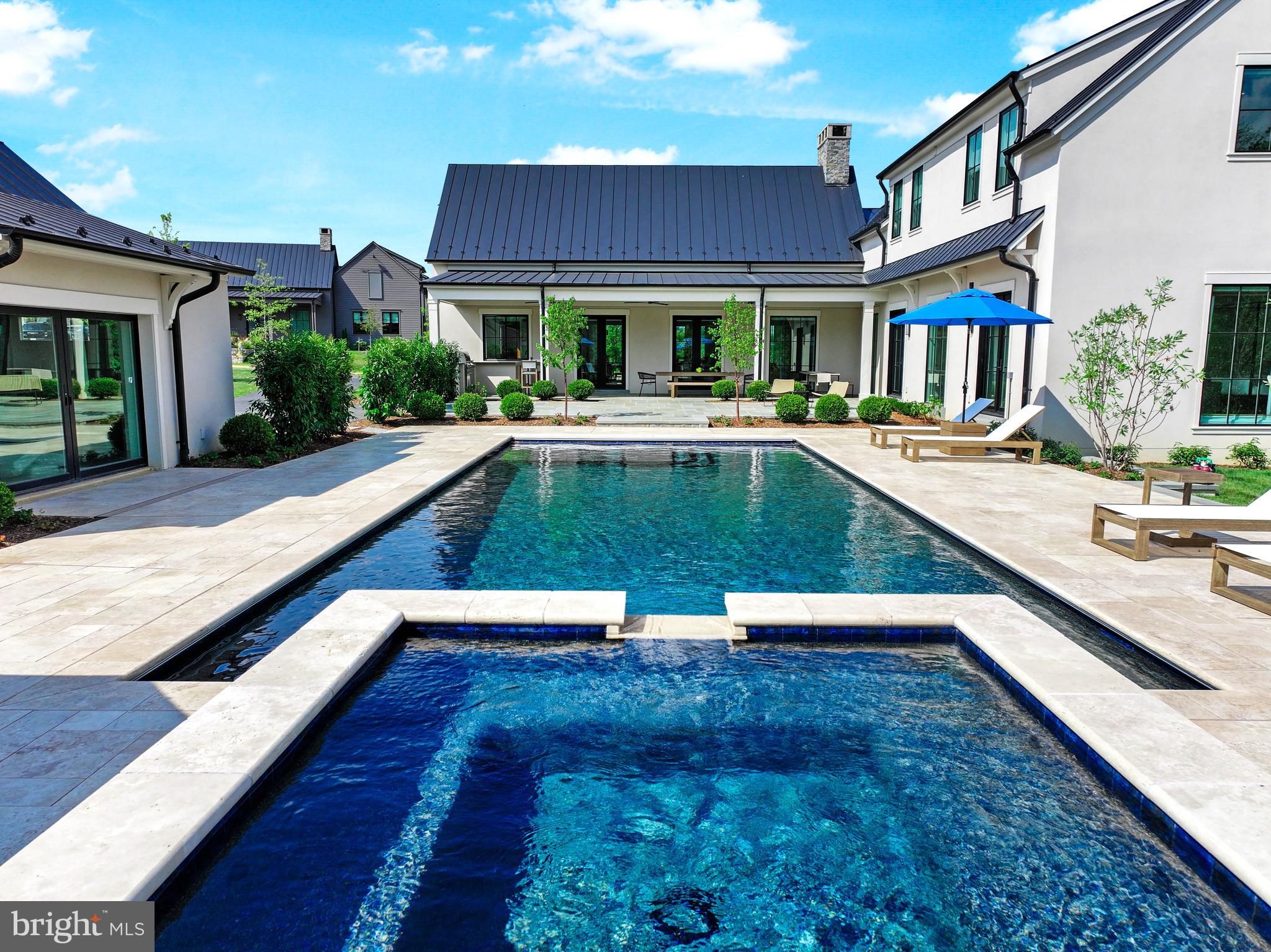 601 Martingale Ridge Drive Middleburg, VA 20117 - Photo 2 of 51 a view of house with swimming pool and furniture