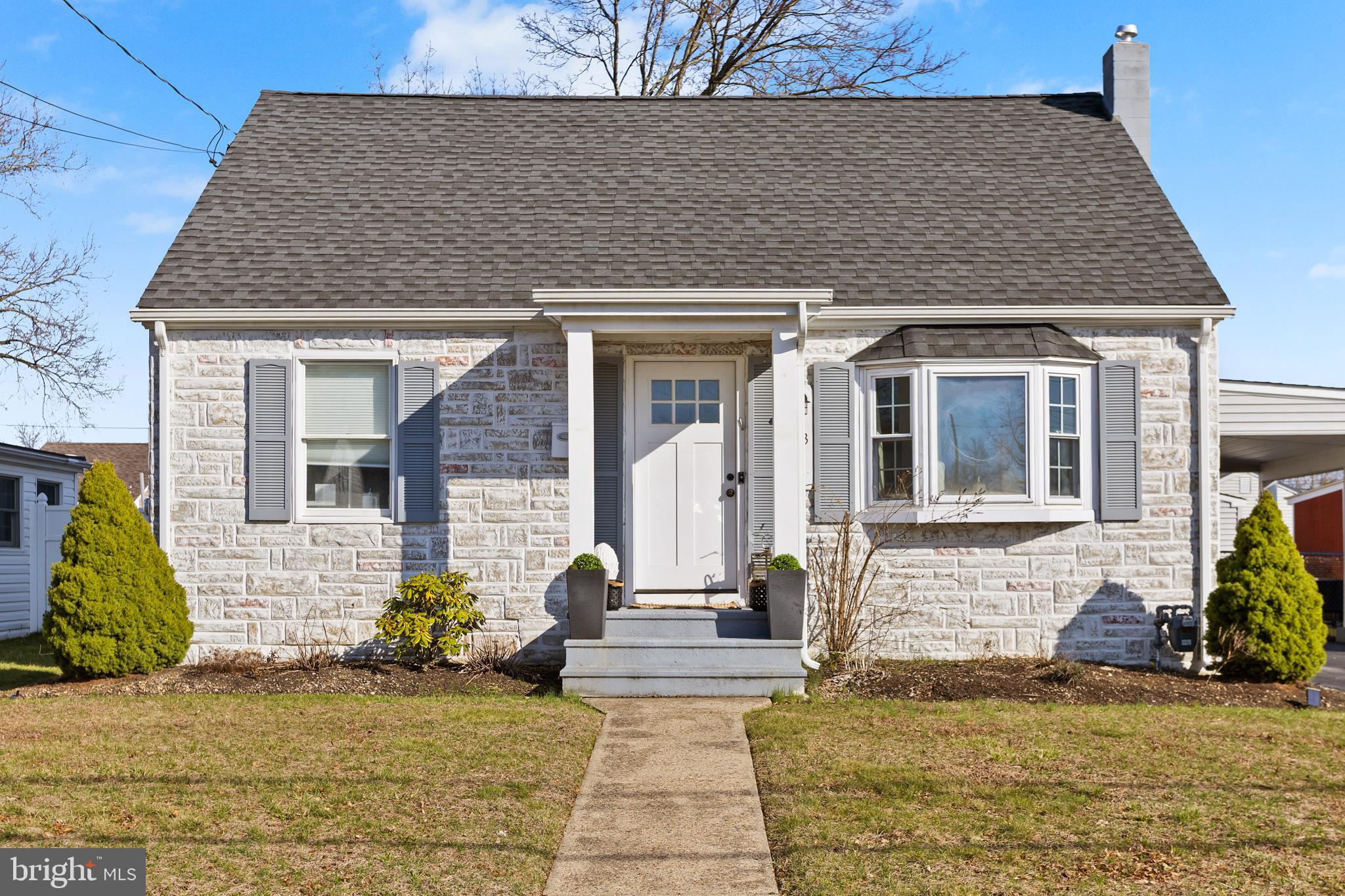 23 Brown Drive Hamilton, NJ 08690 - Photo 1 of 34 a front view of a house with garden