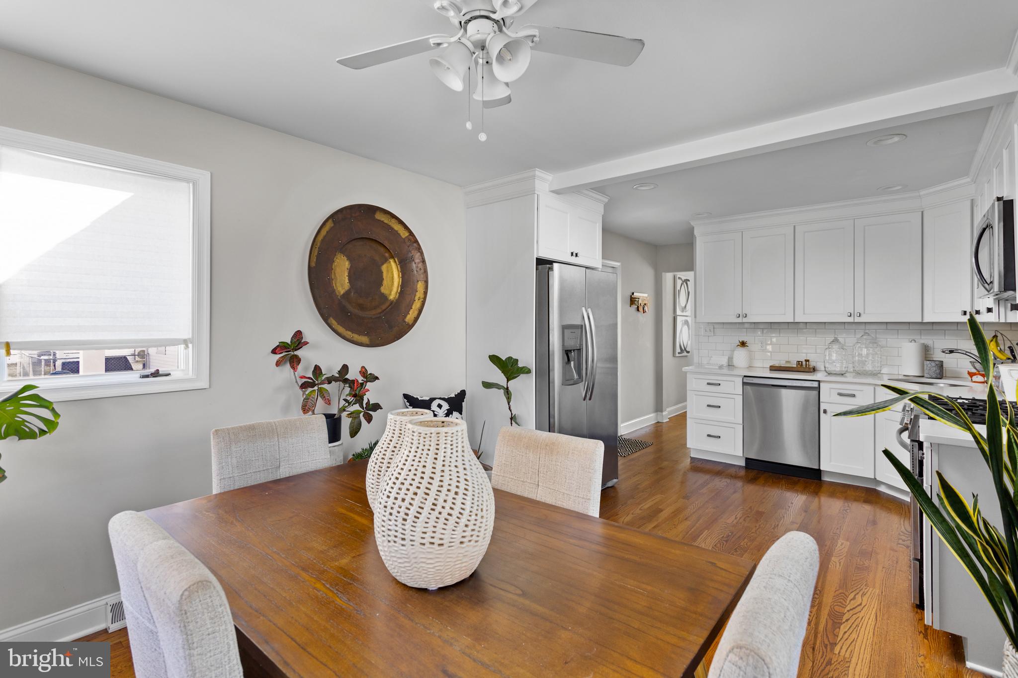 23 Brown Drive Hamilton, NJ 08690 - Photo 12 of 34 a dining room with furniture and wooden floor