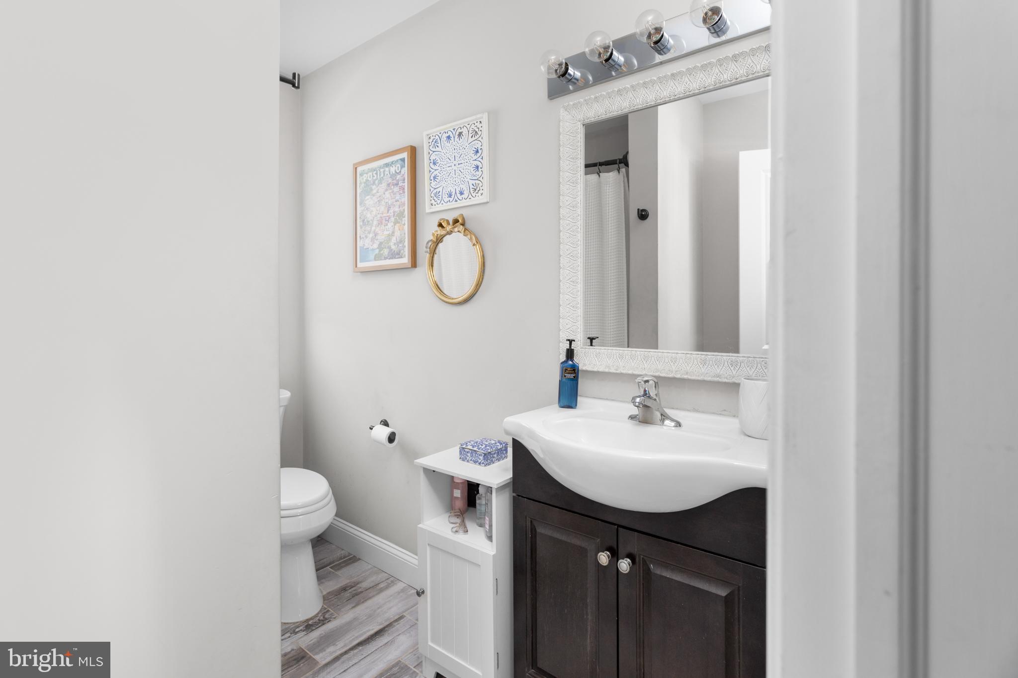23 Brown Drive Hamilton, NJ 08690 - Photo 15 of 34 a bathroom with a sink and a mirror