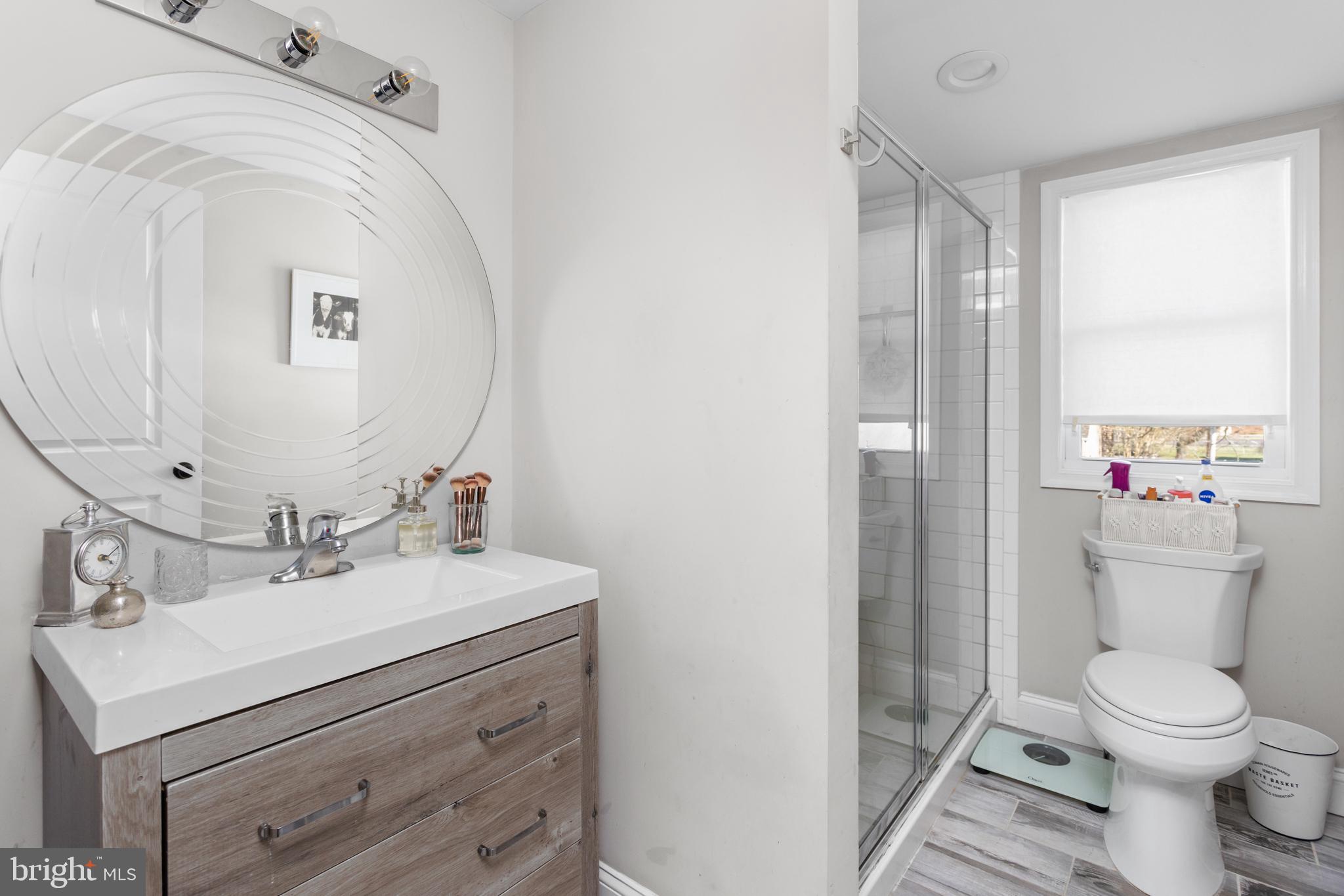 23 Brown Drive Hamilton, NJ 08690 - Photo 19 of 34 a bathroom with a sink toilet and shower