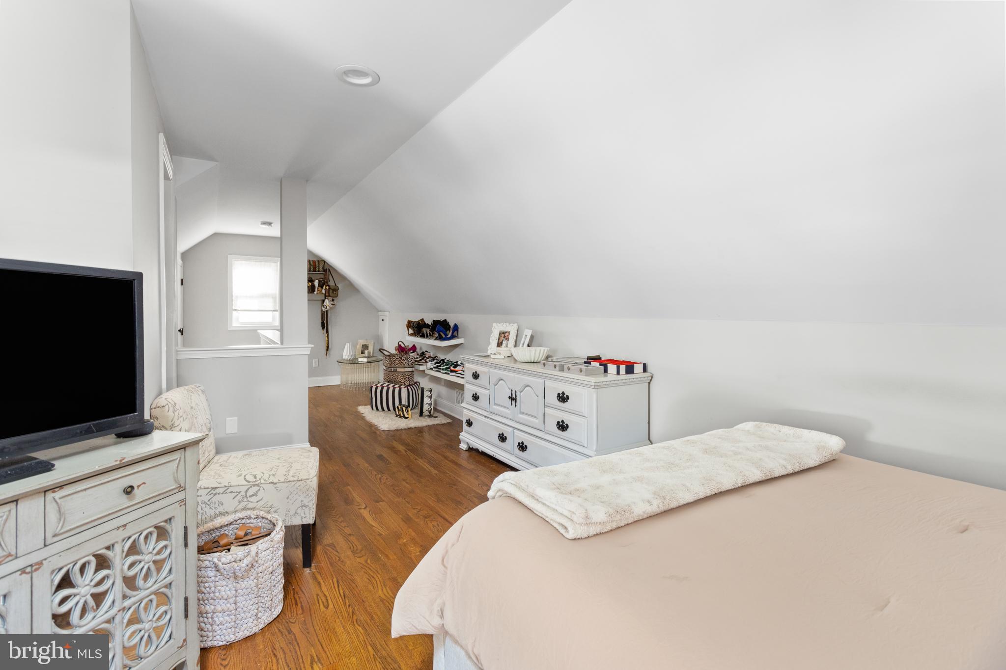 23 Brown Drive Hamilton, NJ 08690 - Photo 20 of 34 a bedroom with a bed and flat screen tv