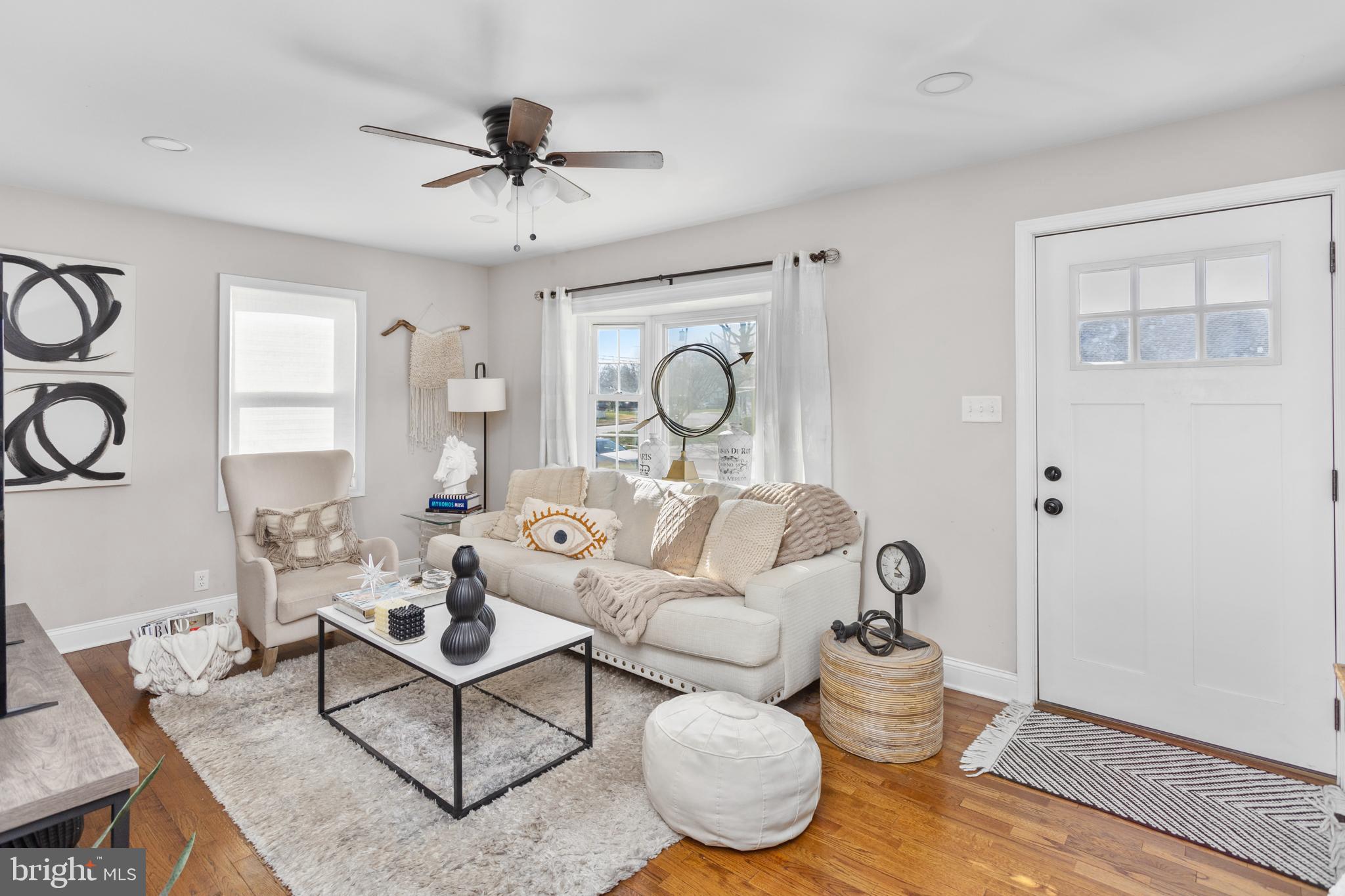 23 Brown Drive Hamilton, NJ 08690 - Photo 5 of 34 a living room with furniture and a window