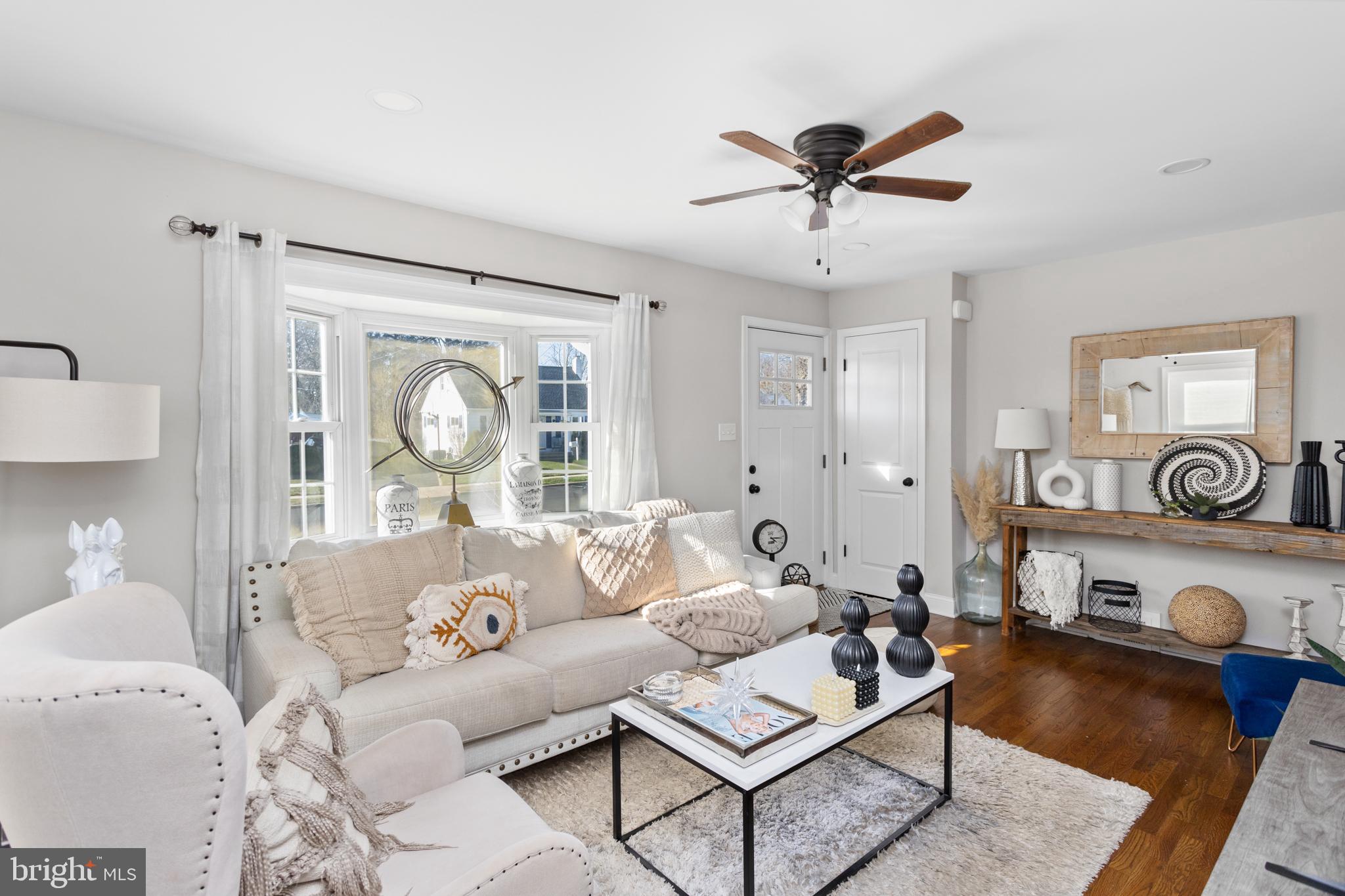 23 Brown Drive Hamilton, NJ 08690 - Photo 6 of 34 a living room with furniture and a window