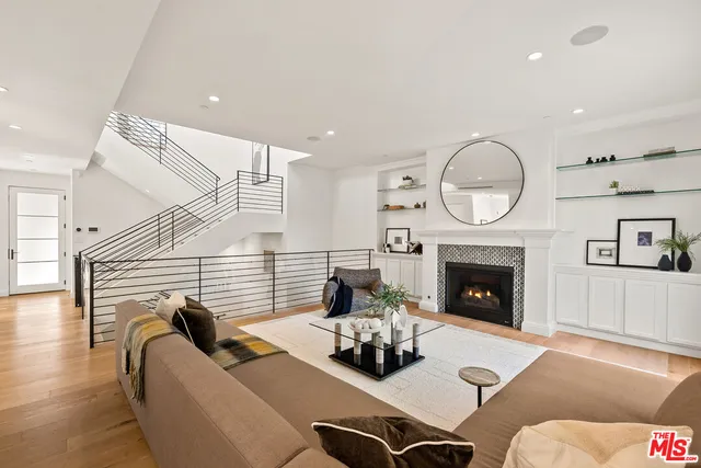 a white bath tub sitting next to a window