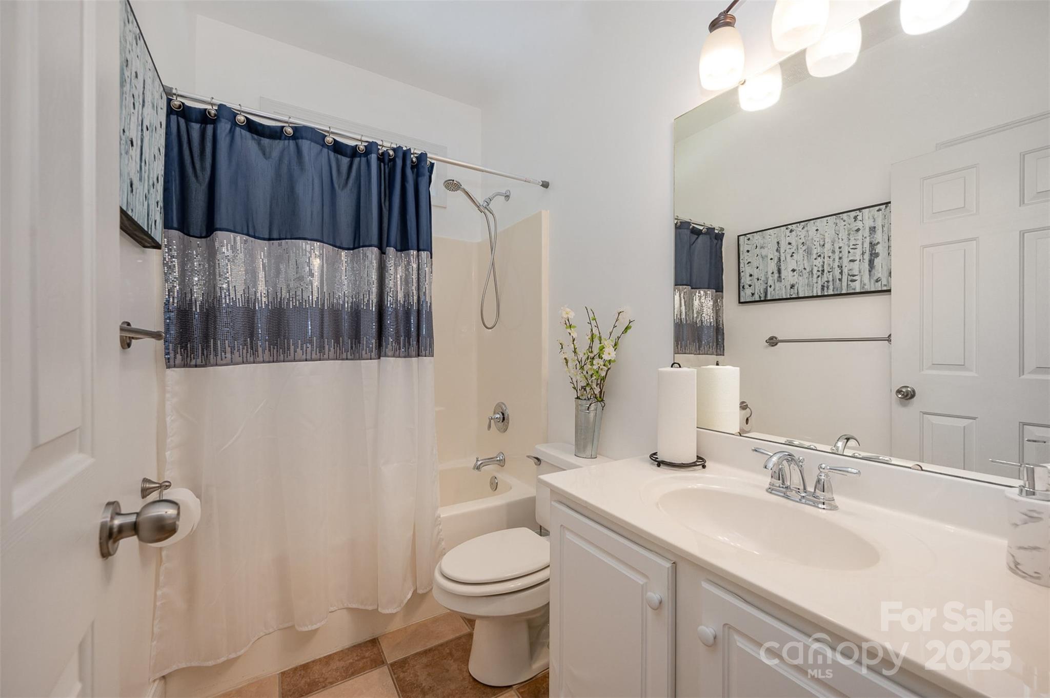 2804 Pulaski Drive Monroe, NC 28110 - Photo 16 of 30 a bathroom with a sink a toilet and shower