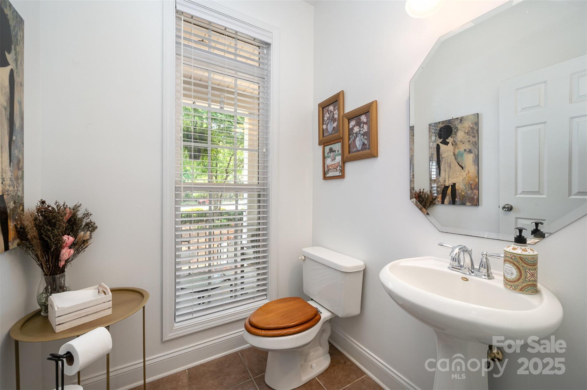 2804 Pulaski Drive Monroe, NC 28110 - Photo 18 of 30 a bathroom with a sink toilet and a mirror