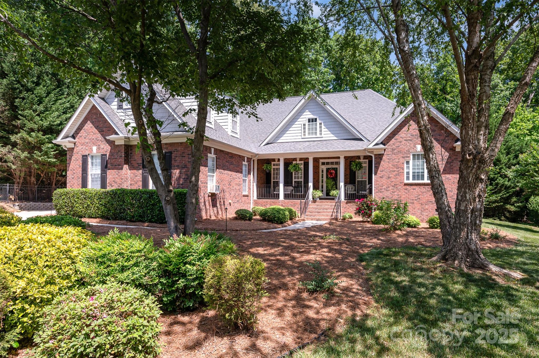2804 Pulaski Drive Monroe, NC 28110 - Photo 2 of 30 a front view of a house with garden