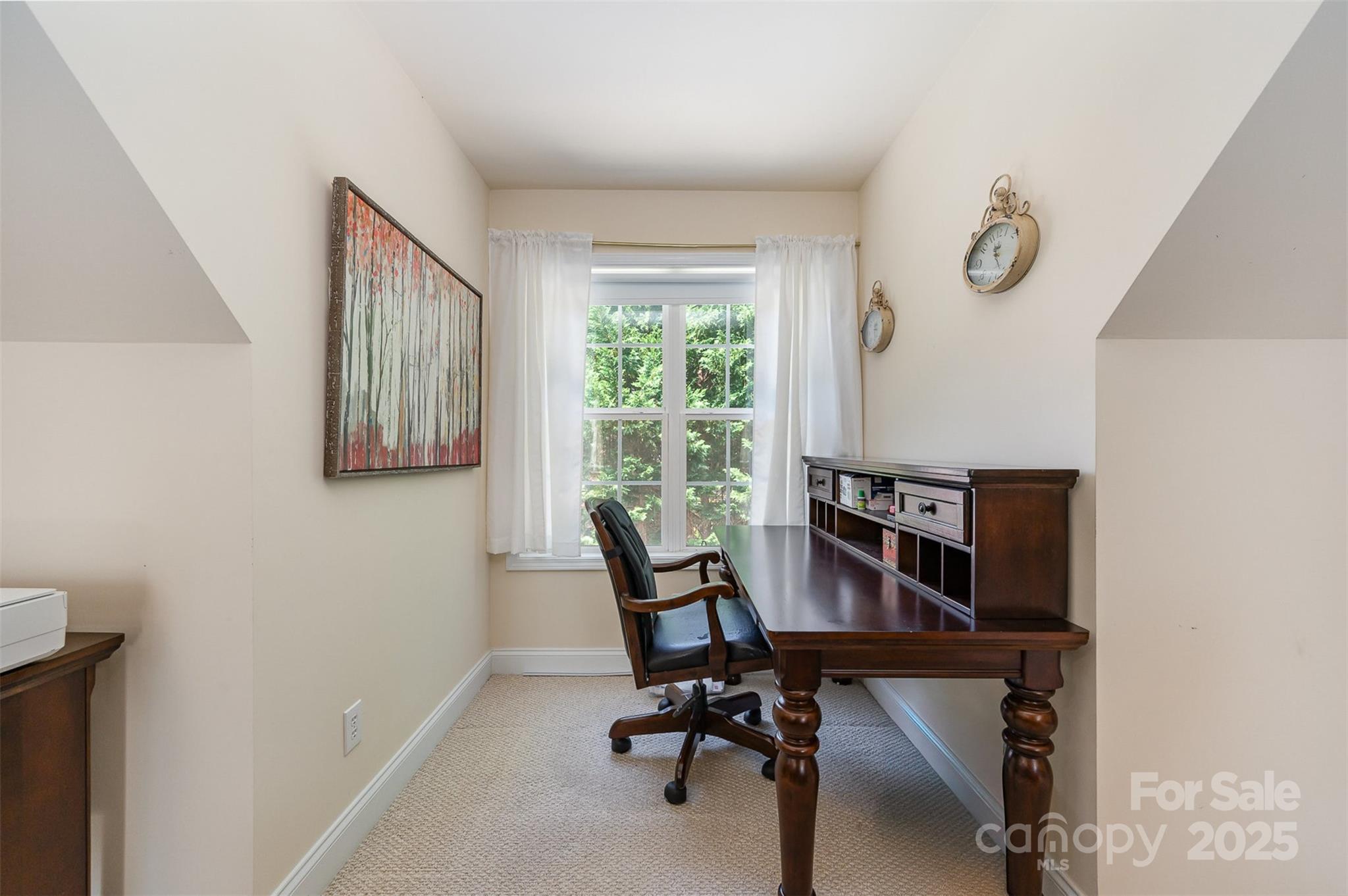 2804 Pulaski Drive Monroe, NC 28110 - Photo 21 of 30 a view of a workspace with furniture and a window