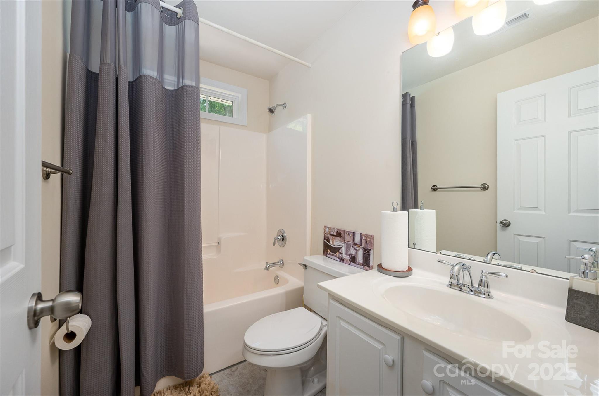 2804 Pulaski Drive Monroe, NC 28110 - Photo 23 of 30 a bathroom with a granite countertop sink toilet and shower