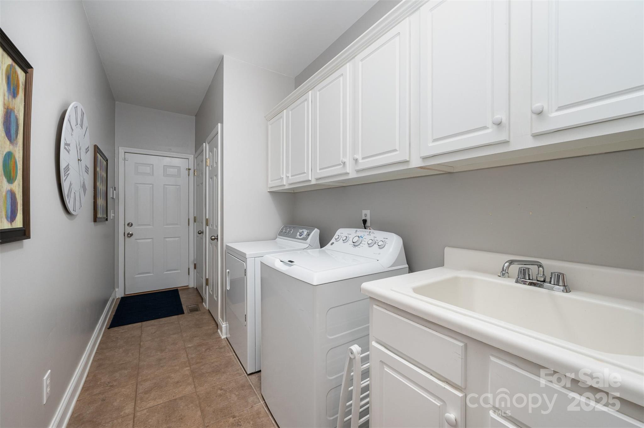 2804 Pulaski Drive Monroe, NC 28110 - Photo 24 of 30 a utility room with dryer and washer