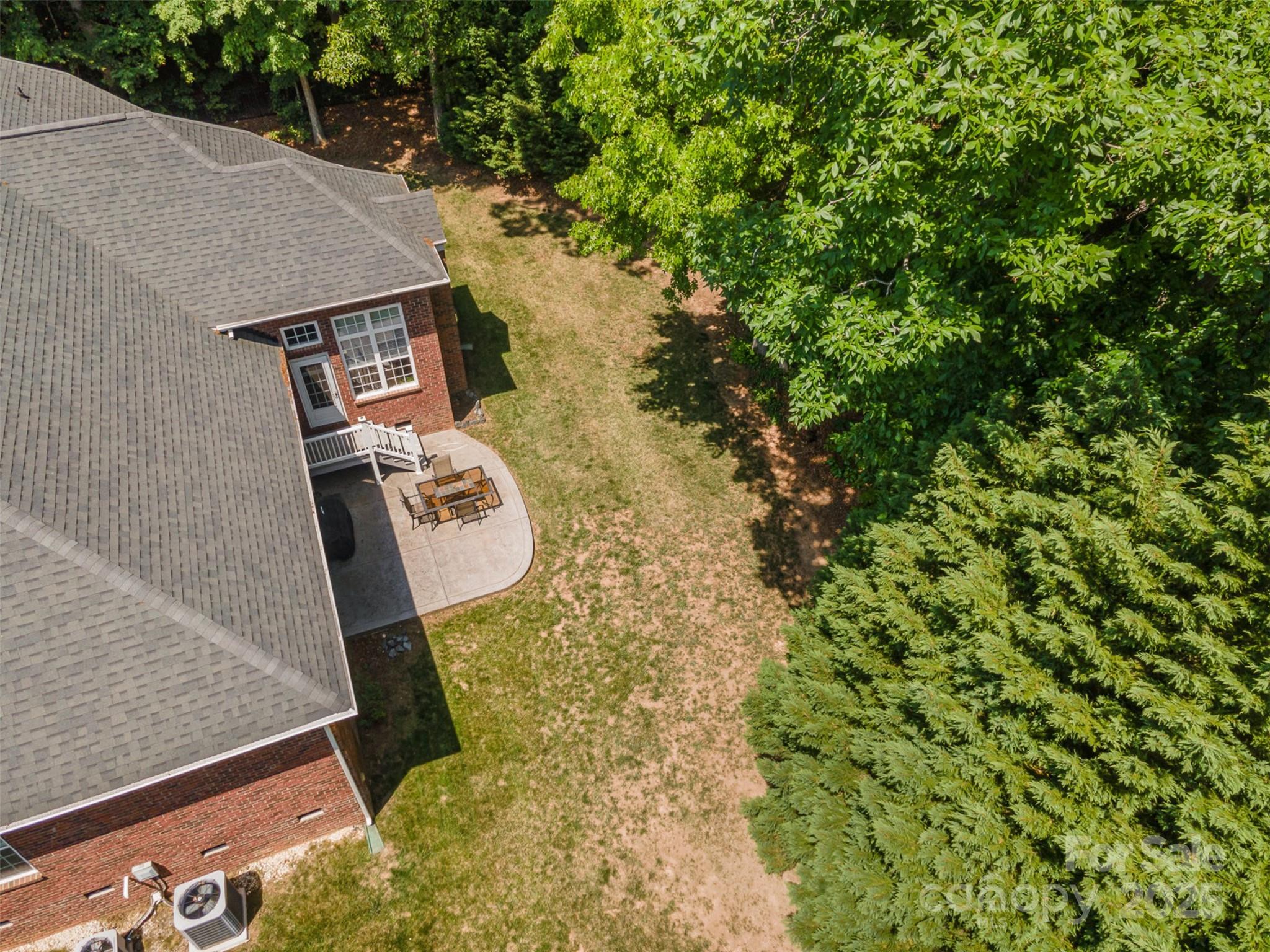 2804 Pulaski Drive Monroe, NC 28110 - Photo 27 of 30 view of backyard with wooden floor and outdoor seating