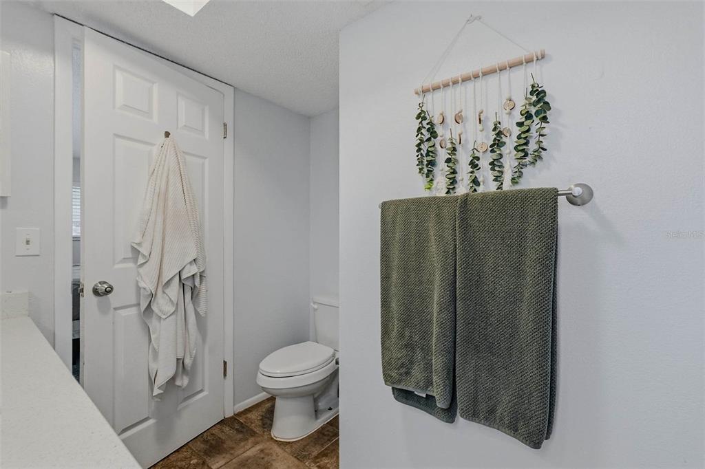 9062 Blackstone Street Spring Hill, FL 34608 - Photo 28 of 49 a bathroom with a toilet and a shower