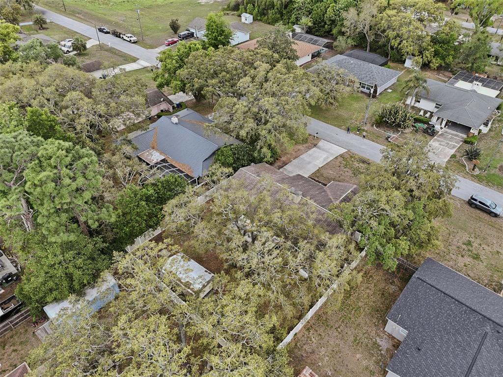 9062 Blackstone Street Spring Hill, FL 34608 - Photo 42 of 49 an aerial view of a house with a yard