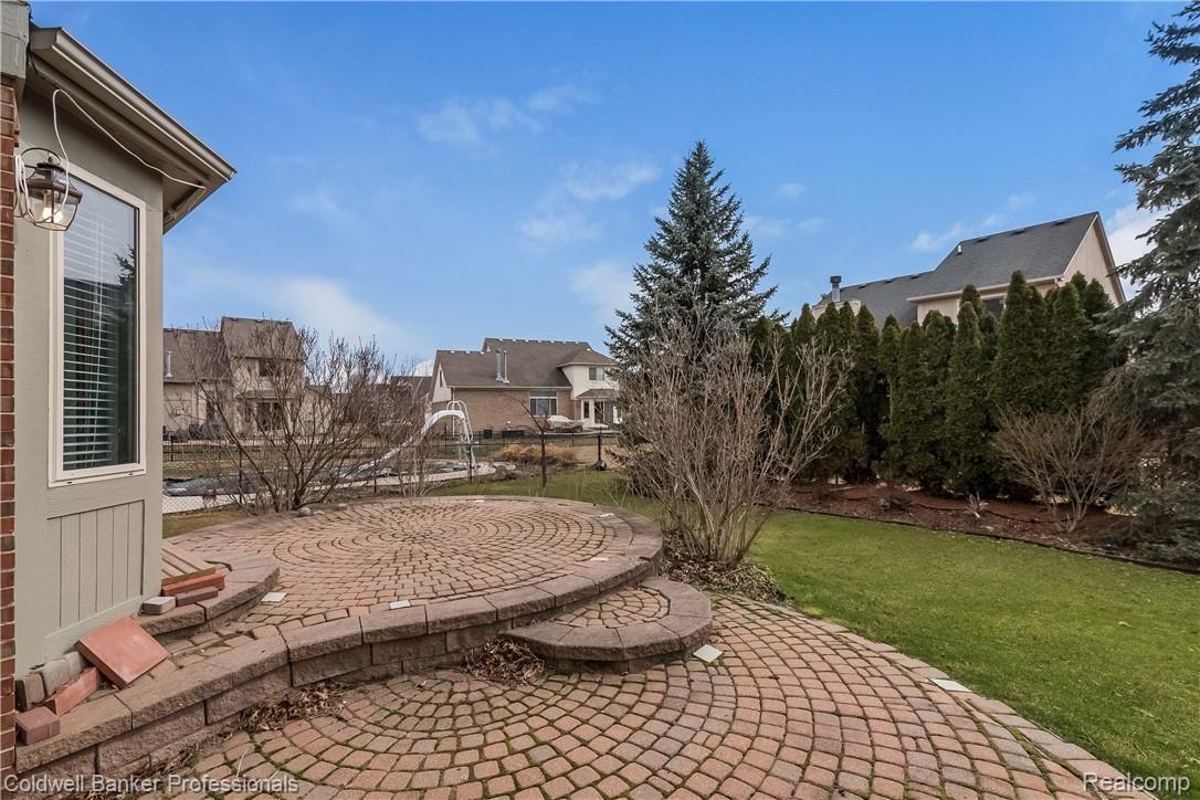 53828 Orson Road New Baltimore, MI 48047 - Photo 31 of 39 tiered brick paver patio with private fenced yard
