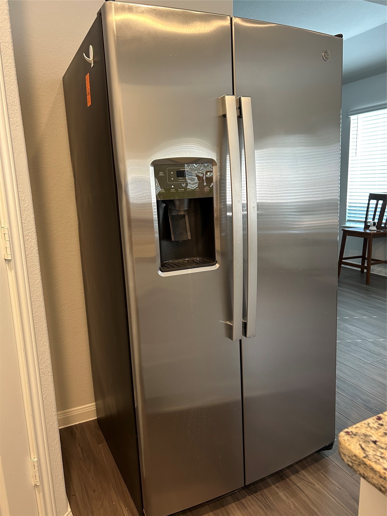 2255 Middle Rdg Drive Conroe, TX 77301 - Photo 6 of 17 a metallic refrigerator freezer sitting inside of a kitchen
