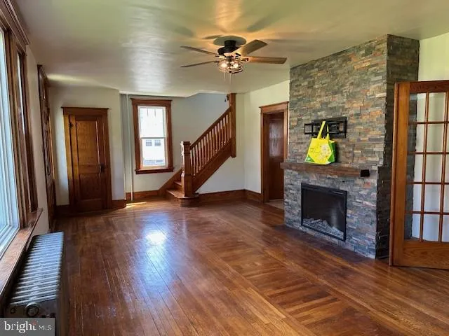 a view of an entryway with a fireplace