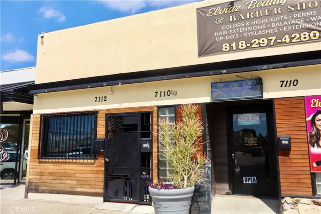 a cafe on the wall of the building