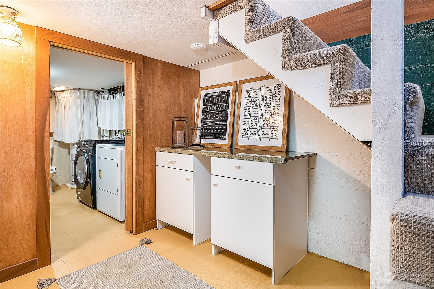 4100 Southwest Raymond Street Seattle, WA 98136 - Photo 18 of 23 a view of a hallway with washer and dryer