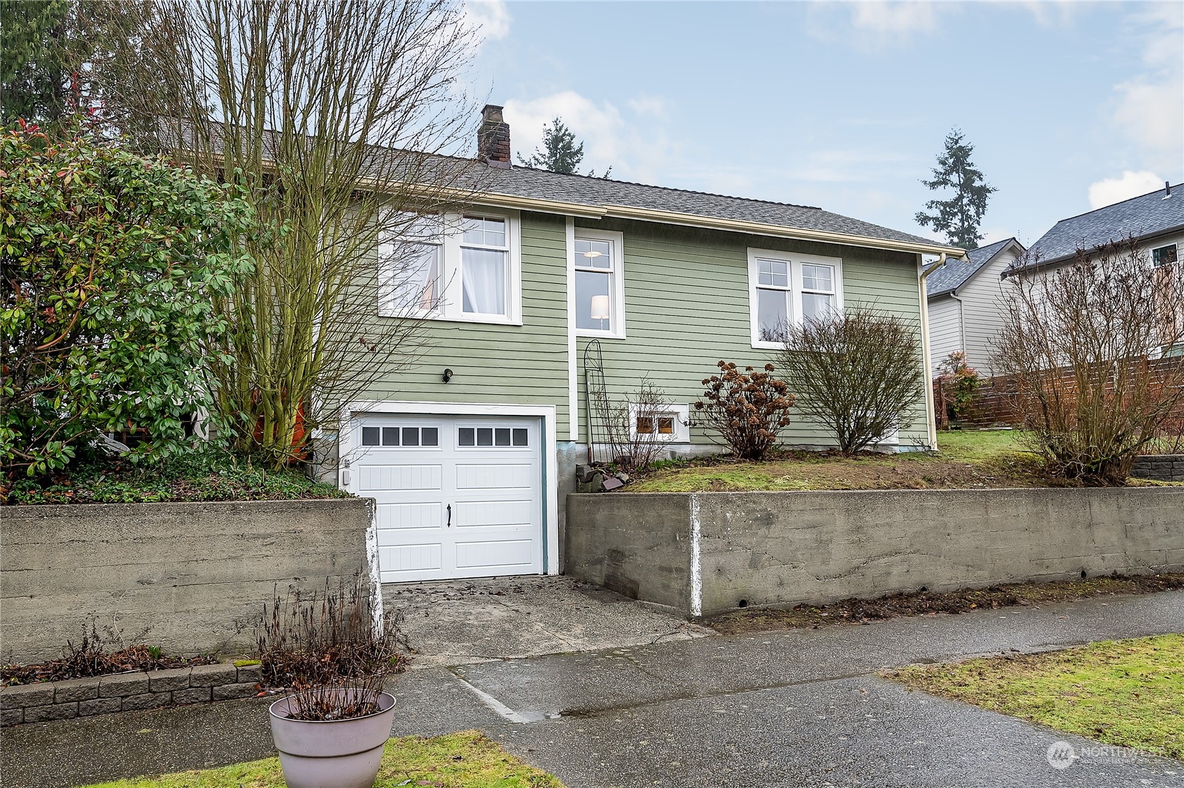 4100 Southwest Raymond Street Seattle, WA 98136 - Photo 21 of 23 a front view of a house with a yard