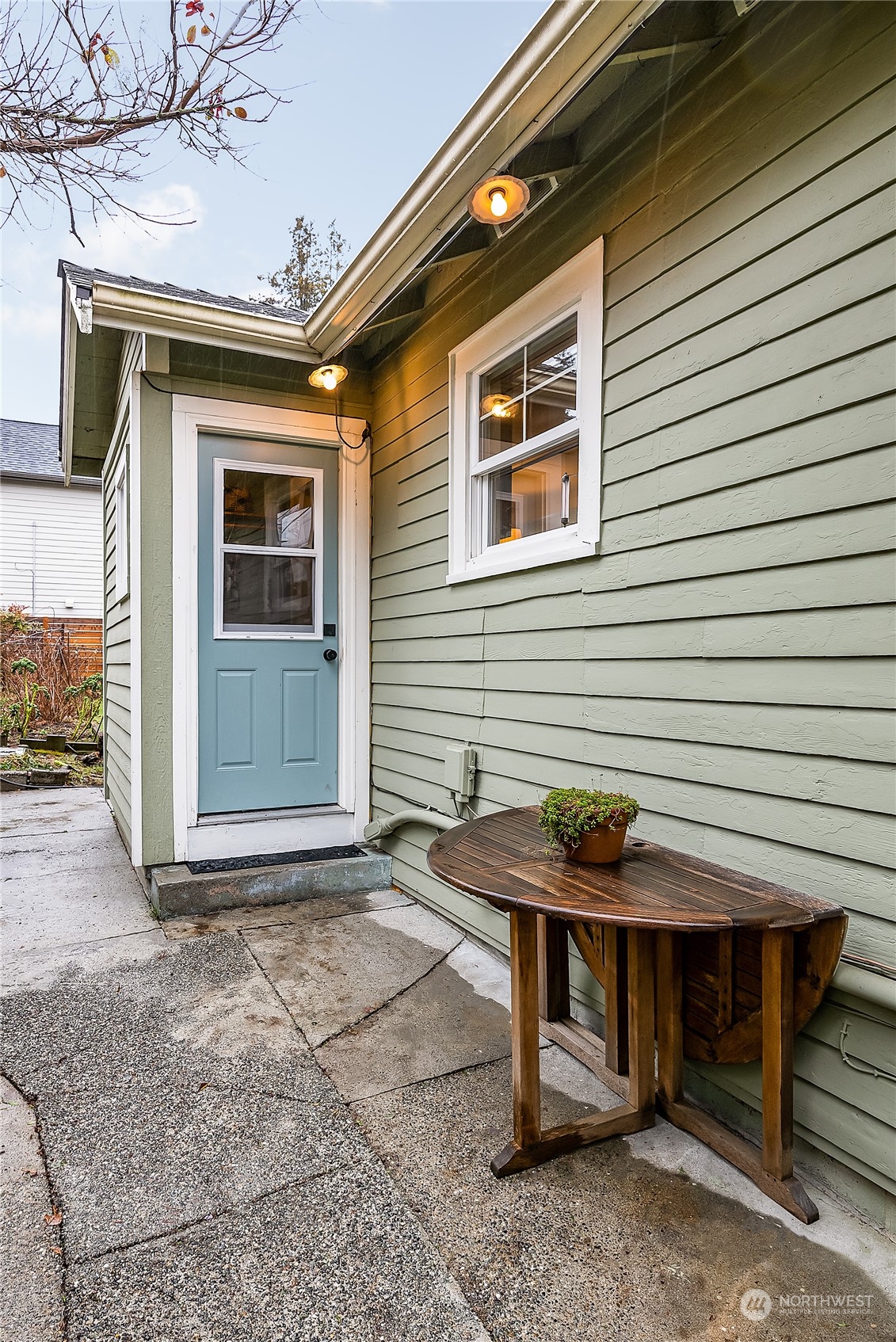 4100 Southwest Raymond Street Seattle, WA 98136 - Photo 23 of 23 a view of a house with a table and chairs