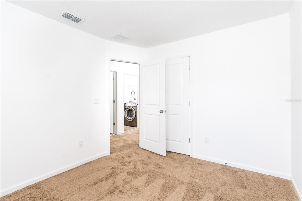 987 Spring Palms Loop Orlando, FL 32828 - Photo 15 of 22 a view of a room with closet