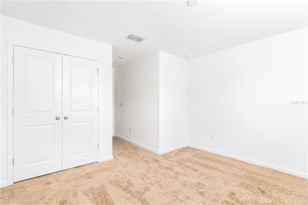 987 Spring Palms Loop Orlando, FL 32828 - Photo 17 of 22 a view of empty room