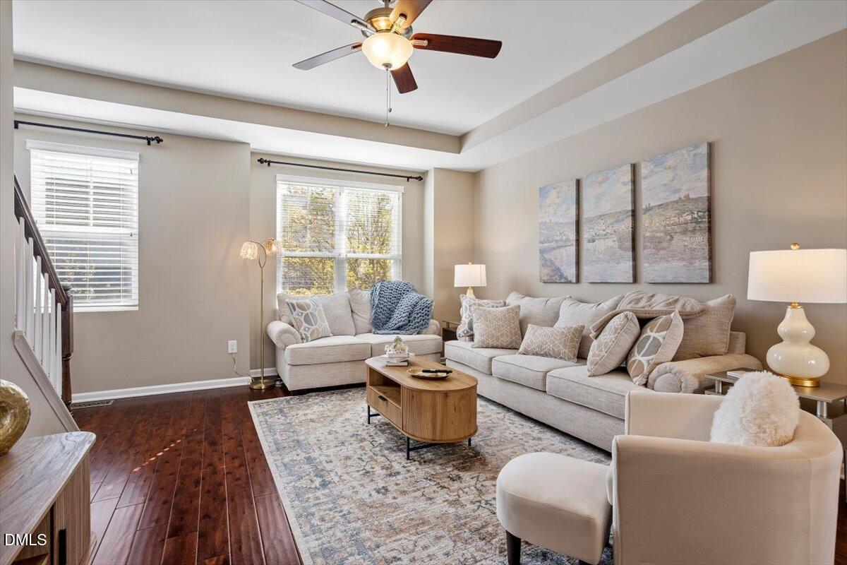 1427 Crafton Way Raleigh, NC 27607 - Photo 2 of 26 a living room with furniture and a large window