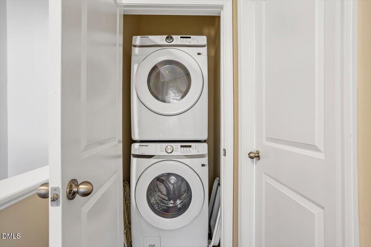 1427 Crafton Way Raleigh, NC 27607 - Photo 22 of 26 a utility room with dryer and washer