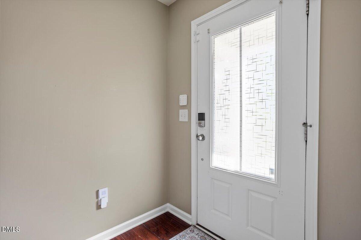 1427 Crafton Way Raleigh, NC 27607 - Photo 23 of 26 a view of an empty room with a window