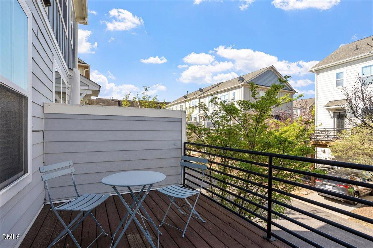 1427 Crafton Way Raleigh, NC 27607 - Photo 24 of 26 a view of a balcony with wooden floor