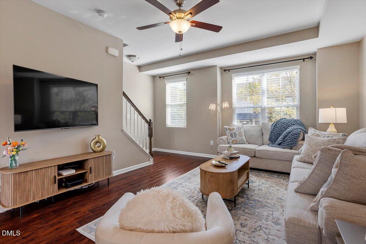 1427 Crafton Way Raleigh, NC 27607 - Photo 3 of 26 a living room with furniture and a flat screen tv