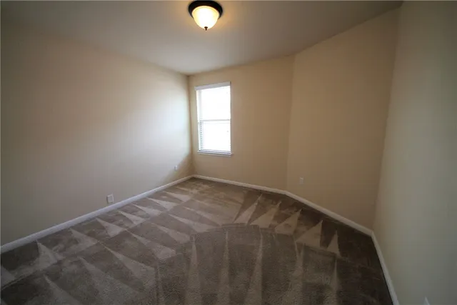 a view of empty room with window