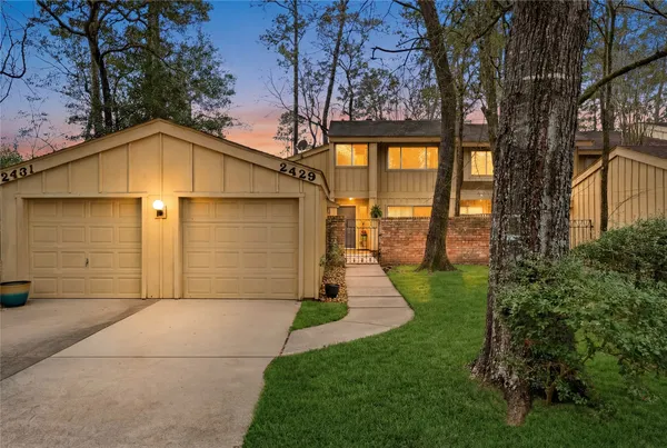 a view of a back yard of the house