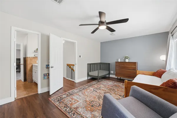 a living room with furniture and a rug
