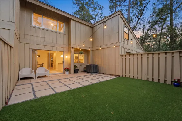 a backyard of a house with lots of green space