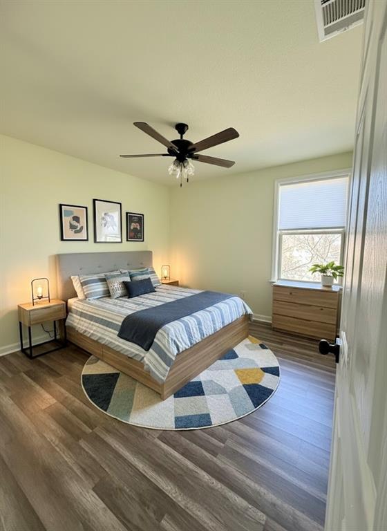 2864 Burchill Road Fort Worth, TX 76105 - Photo 24 of 26 a bedroom with a bed and a window