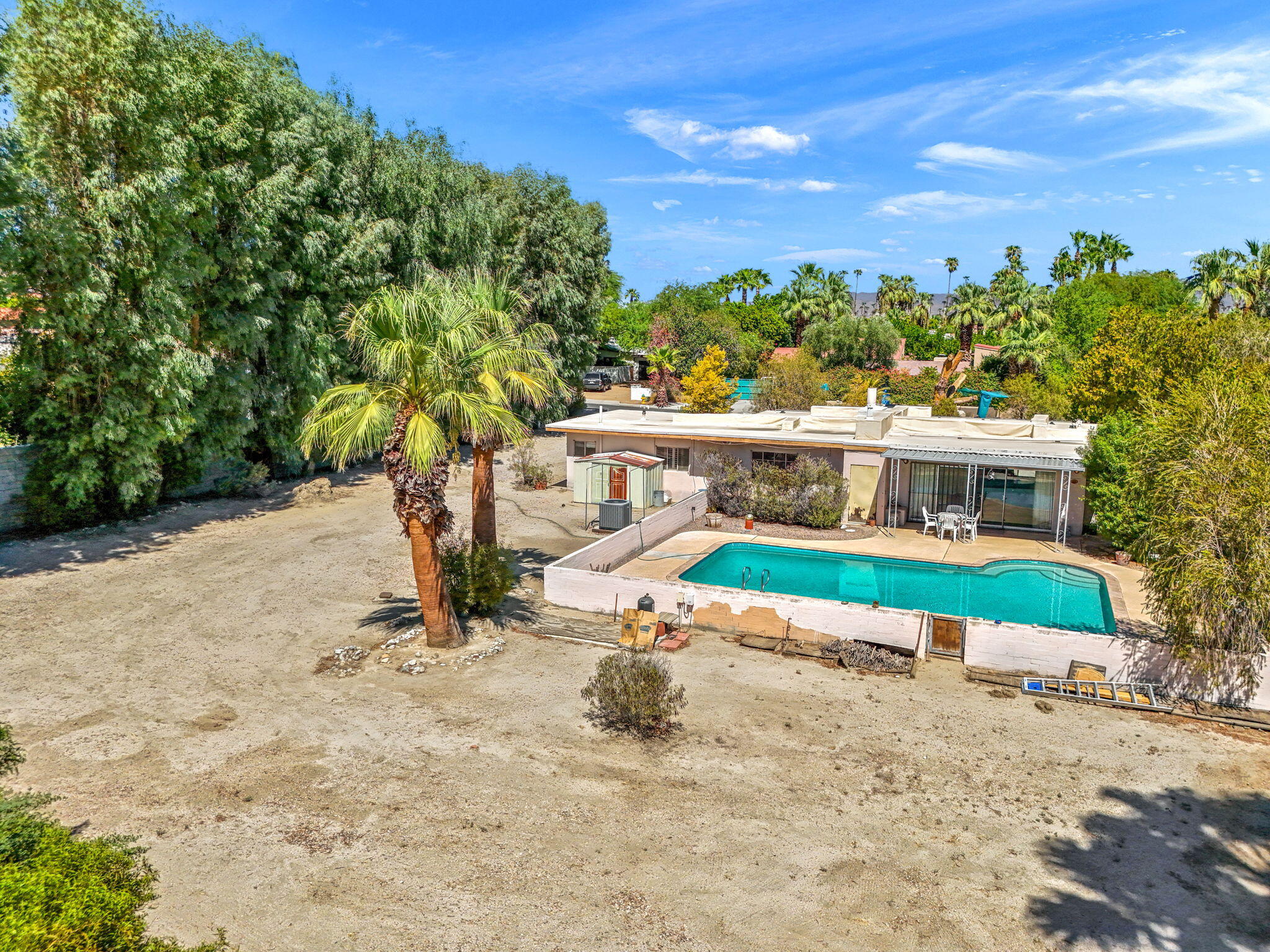72227 Rancho Road Rancho Mirage, CA 92270 - Photo 4 of 47 a view of an outdoor space with seating