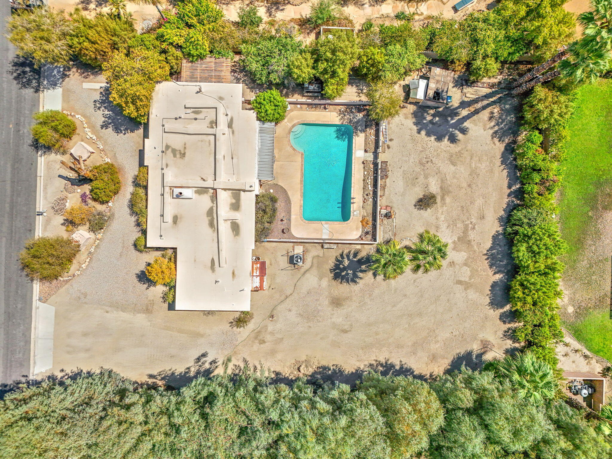 72227 Rancho Road Rancho Mirage, CA 92270 - Photo 8 of 47 an aerial view of residential house with outdoor space and trees