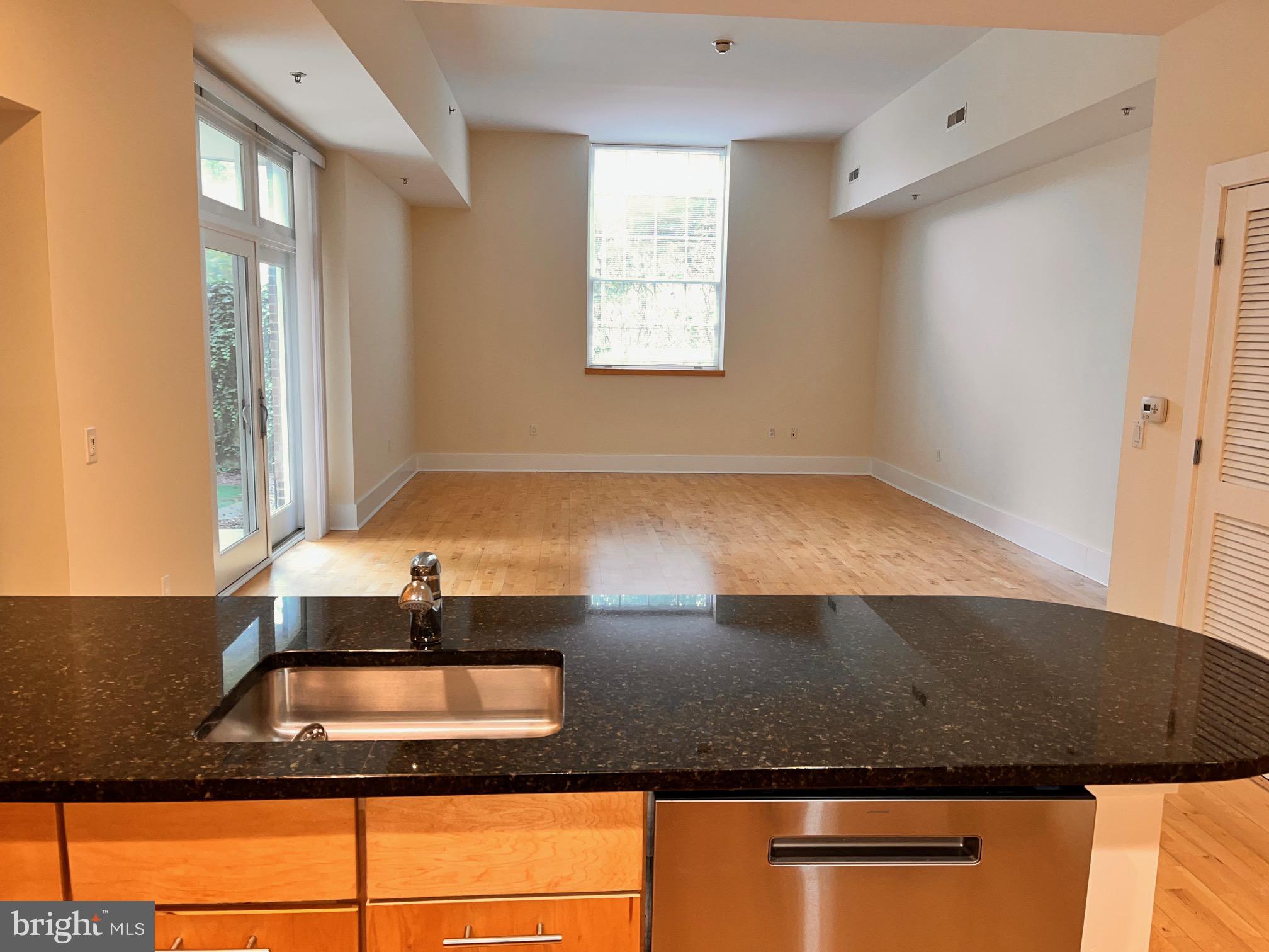 35 Quarry Street, Unit 104 Princeton, NJ 08542 - Photo 7 of 12 a kitchen with a sink and a window