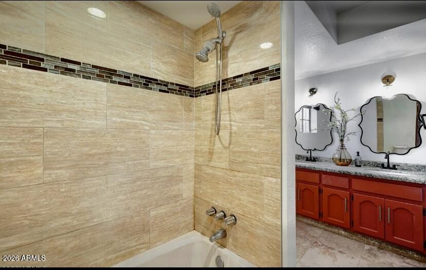 908 West Flynn Lane Phoenix, AZ 85013 - Photo 14 of 23 a bathroom with a double vanity sink mirror and shower