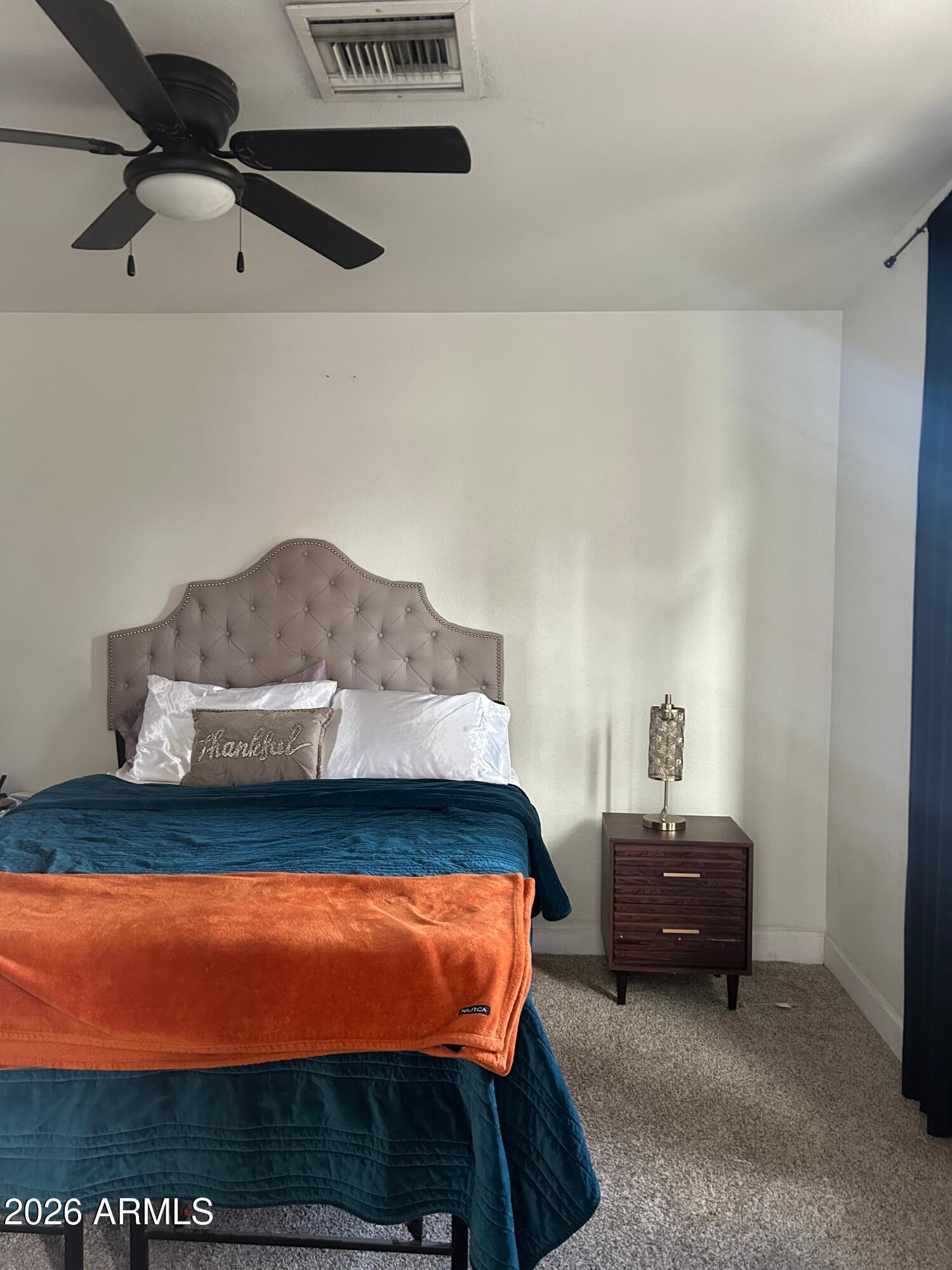 908 West Flynn Lane Phoenix, AZ 85013 - Photo 17 of 23 a bedroom with a bed and window