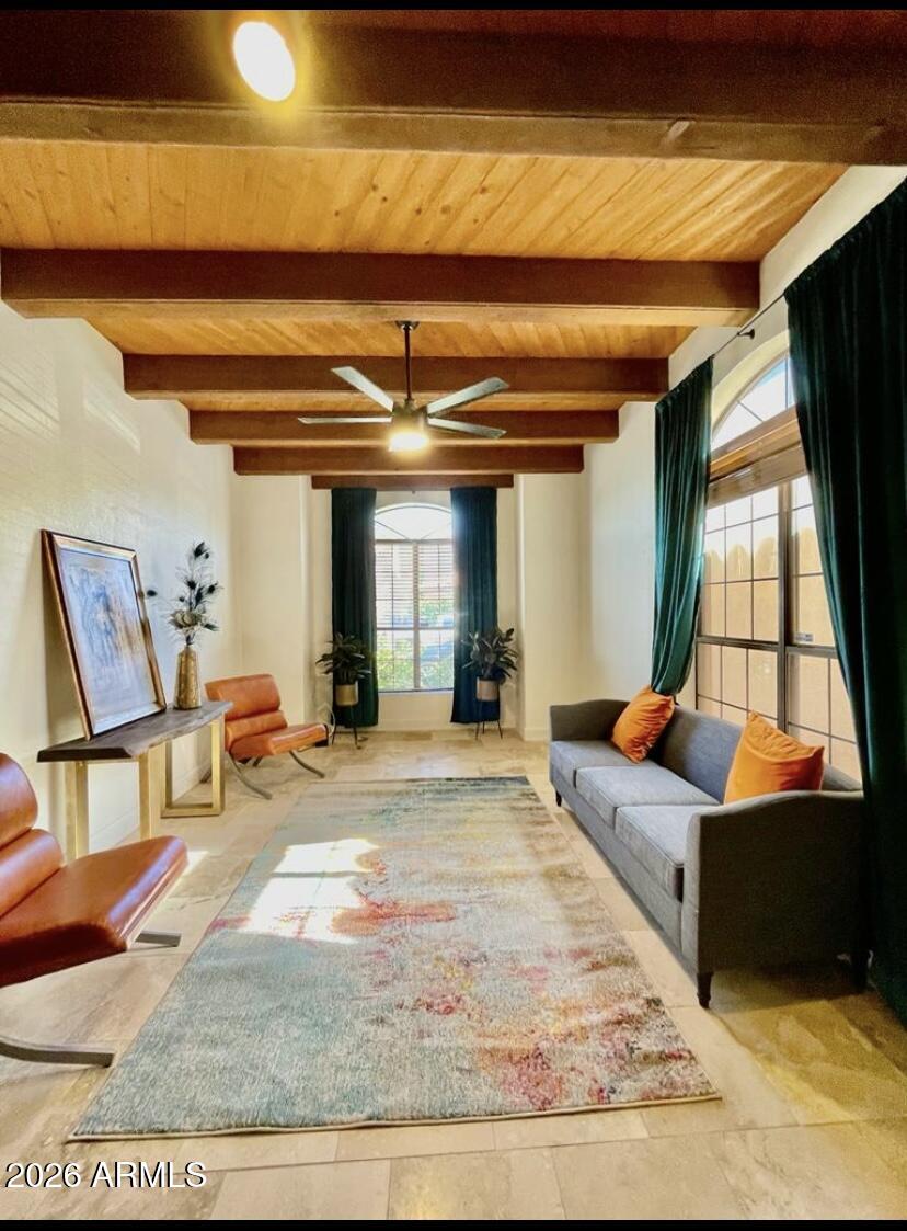 908 West Flynn Lane Phoenix, AZ 85013 - Photo 2 of 19 a living room with furniture rug and window