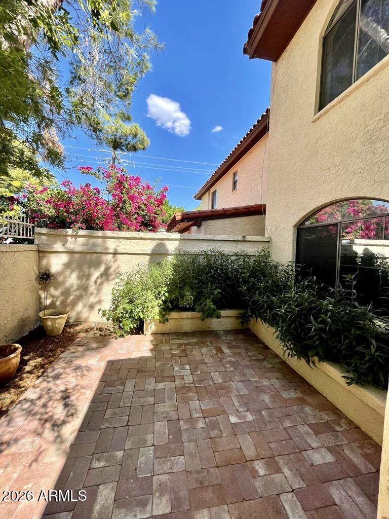 908 West Flynn Lane Phoenix, AZ 85013 - Photo 22 of 23 a view of a house with a yard