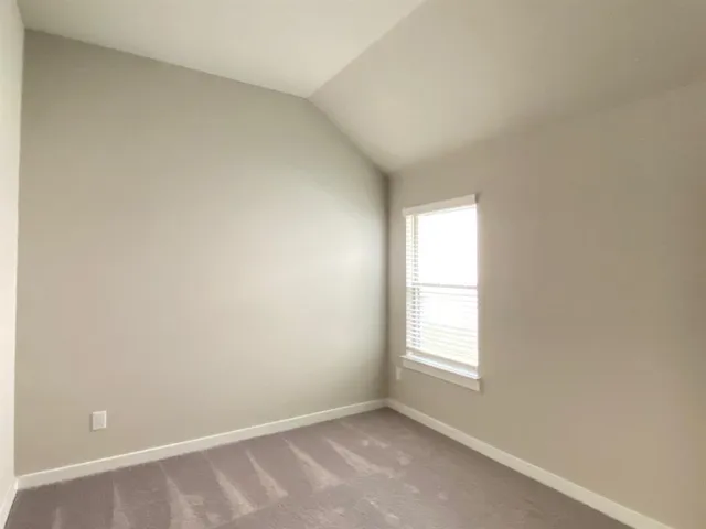 a bathroom with a double vanity sink and mirror with shower