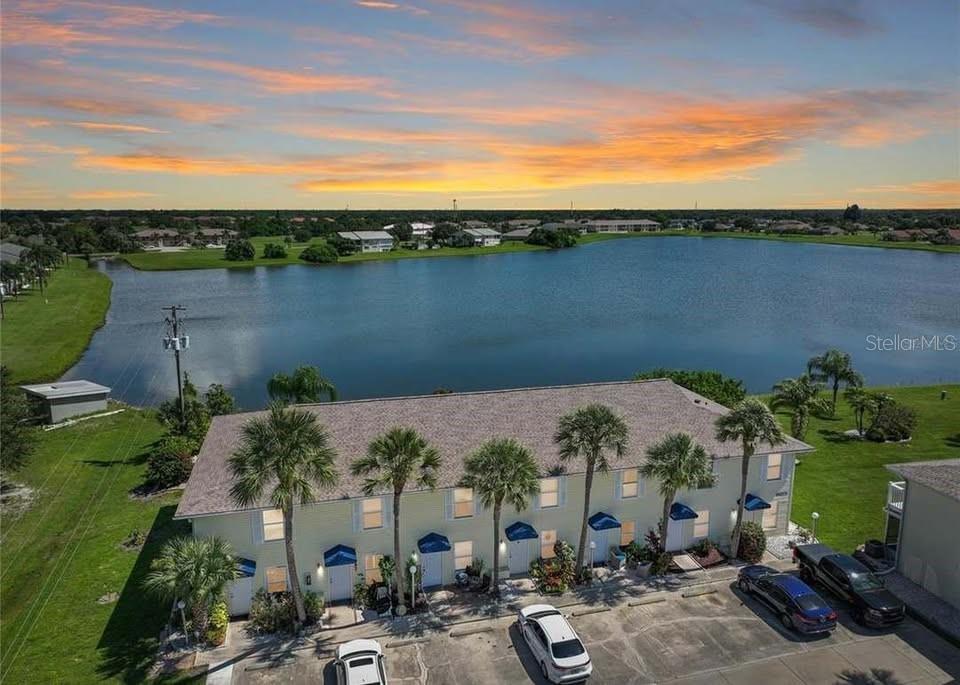 26272 Rampart Boulevard, Unit G107 Punta Gorda, FL 33983 - Photo 1 of 11 an aerial view of a house with a lake view