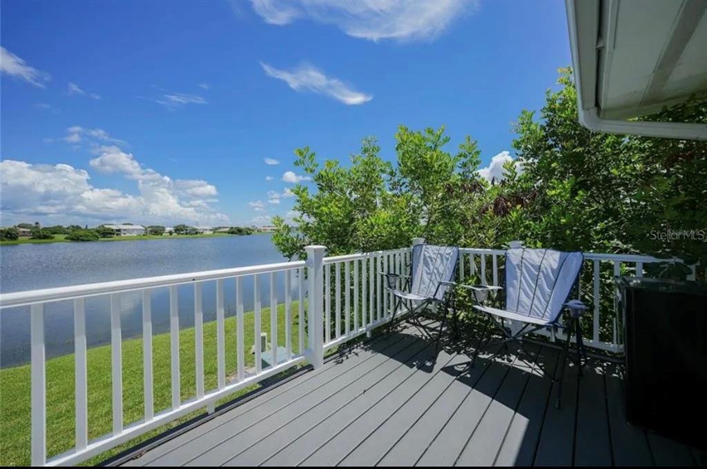26272 Rampart Boulevard, Unit 107 Punta Gorda, FL 33983 - Photo 11 of 18 a view of a wooden fence