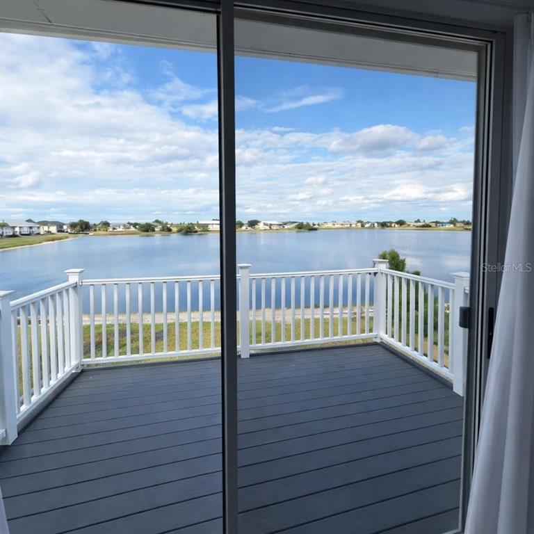26272 Rampart Boulevard, Unit 107 Punta Gorda, FL 33983 - Photo 10 of 18 a view of deck with balcony